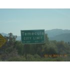 Temecula: Signage on southbound I-15 with altitude and population.
