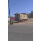 Oroville: : an old train car plopped into middle of a back neighborhood of Oroville, CA