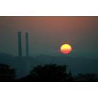 Danville: : Smokestacks from the now empty Dan River Plant in the sunrise.