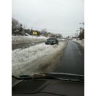 Centereach: Someone else's car still stuck in middle of middle country rd Monday 2/11 after blizzard all plowed around